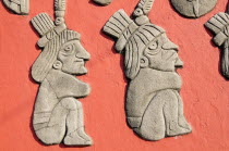 Mexico, Veracruz, Papantla, Relief carving of Totonac figures on the Mural Cultural Totonaca in the Zocalo.