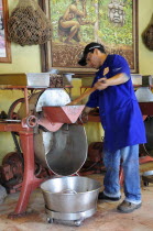 Mexico, Oaxaca, Making chocolate at Mayordomo chocolate shop.