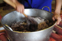 Mexico, Oaxaca, Making chocolate at Mayordomo chocolate shop.