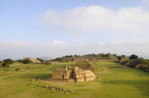 Mexico, Oaxaca, Monte Alban archaeological site, Ruins of Monticulo J and Edifio I, H and G buildings in the central plaza.