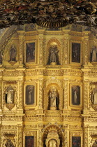 Mexico, Oaxaca, Church of Santo Domingo, Interior and carved and gilded altarpiece with paintings and painted, sculpted, figures.