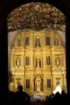 Mexico, Oaxaca, Santo Domingo Church, Ornately decorated interior with carved and gilded altarpiece.