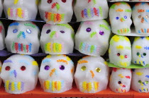 Mexico, Puebla, Sugar candies in the form of skulls for Dia de los Muertos or Day of the Dead festivities.