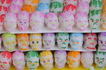 Mexico, Puebla, Sugar candies in the shape of skulls for Dia de los Muertos or Day of the dead celebrations.