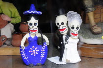 Mexico, Oaxaca, Skull figures for Dia de los Muertos or Day of the Dead festivities.