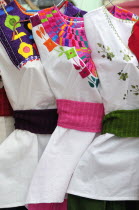 Mexico, Oaxaca, Hand embroidered blouses for sale.
