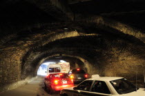 Mexico, Bajio, Guanajuato, Subterranean road with vehicles.
