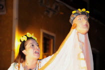 Mexico, Bajio, Guanajuato, Actor in street performance during the Cervantino cultural festival.