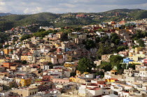 Mexico, Bajio, Guanajuato, City view of housing spread across hillside to distance.