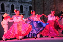 Mexico, Jalisco, Guadalajara, Plaza Tapatia, Folk dancers from Oaxaca State perform at carnival.