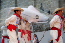 Mexico, Jalisco, Guadalajara, Plaza Tapatia, Guerrero folk dance performance in carnival.