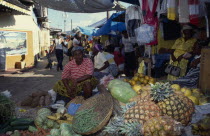 West Indies, Jamaica, Port Antonio, fruit and vegetable vendors at street market.
