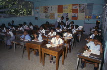 West Indies, Jamaica, Children at desks in classroom