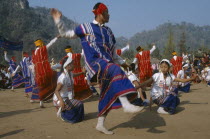 Thailand, North, Karen dancers celebrating the new year in Mae La refugee camp near Mae Sot on the Thai border between Myanmar.