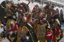 Bolivia, Oruro, La Diablada carnival procession and spectators.