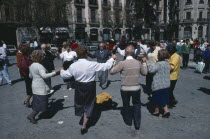 Spain, Catalonia, Barcelona, people dancing the Sardana in front of the Cathedral.