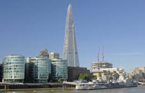 England, London, The Shard with City Hall and HMS Belfast in the foreground.