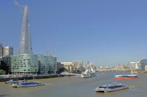 England, London, The Shard with City Hall and HMS Belfast in the foreground.