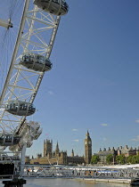 England, London, The London Eye and Houses of Parliament.
