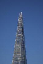 England, London, Southwark southbank, The Shard skyscraper designed by Renzo Piano in the city's London Bridge Quarter, viewed from north of the River Thames.