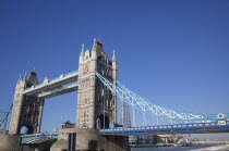 England, London, Tower Bridge with HMS Belfast visible.