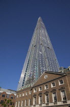 England, London, Southwark southbank, The Shard skyscraper designed by Renzo Piano in the city's London Bridge Quarter, seen from Guys Hospital.