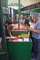 England, London, Southwark, Borough Market, Londons oldest fresh fruit and vegetable market, stall selling salt beef sandwiches.