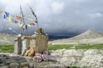 Nepal, Upper Mustang, Chortens and the distant ancient ruins at Lo Manthang.