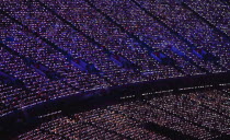 England, London, Stratford , Olympic games closing ceremony, LED paddles visible in the darkness.