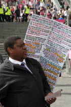 England, London, Stratford, Evangelist preaching to passers by.