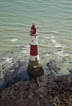 England, East Sussex, Beachy Head lighthouse seen from the cliff top.