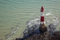 England, East Sussex, Beachy Head lighthouse seen from the cliff top.