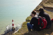 England, East Sussex, Beachy Head lighthouse seen from the cliff top.