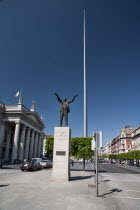 Ireland, Dublin, Jim Larkin and the Spire in O'Connell Street with General Post Office on the left.