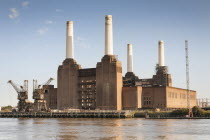 England, London, Battersea Power Station beside the River Thames.