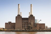 England, London, Battersea Power Station beside the River Thames.