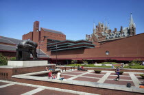 England, London, View of the British Library showing Eduardo Paolozz sculpture, Euston Road.