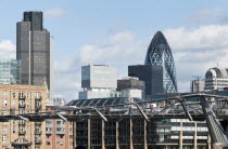 England, London, The City of London financial centre and the Millenium bridge.