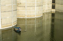 Bangladesh, Dhaka, National Assembly building designed by Louis Kahn using innovative concrete and geometric design.