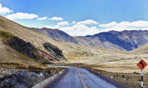 Peru, Puno, Road going up to Abra La Raya at 14,000 feet.