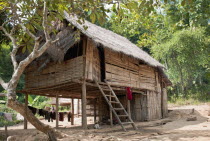 Laos, Bamboo Hut in Village next to the Mekong River.