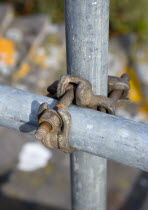 Architecture, Construction, Building, Detail of scaffolding double coupler attached to poles.