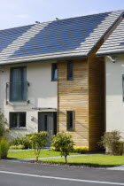 Architecture, Alternative Energy, Electricity, Solar photovoltaic roof tiles or slates on new houses by Linden Homes in Graylingwell Park.