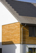 Architecture, Alternative Energy, Electricity, Solar photovoltaic roof tiles or slates on new houses by Linden Homes in Graylingwell Park.