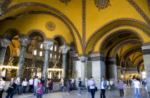 Turkey, Istanbul, Sultanahmet, Haghia Sophia Tourists in the vaulted decorative North Gallery.