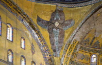 Turkey, Istanbul, Sultanahmet, Haghia Sophia Mural of a six winged seraph or angel below the central dome.