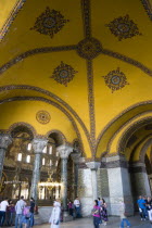 Turkey, Istanbul, Sultanahmet, Haghia Sophia Tourists in the vaulted decorative North Gallery.