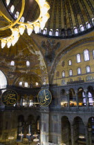 Turkey, Istanbul, Sultanahmet, Haghia Sophia Christian murals and Muslim iconography in calligraphic roundels together in the domed interior.