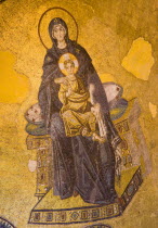 Turkey, Istanbul, Sultanahmet, Haghia Sophia Mural of Virgin Mary holding the baby infant Jesus in the domed interior.