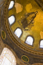 Turkey, Istanbul, Sultanahmet, Haghia Sophia Mural of Virgin Mary holding the baby infant Jesus in the domed interior.